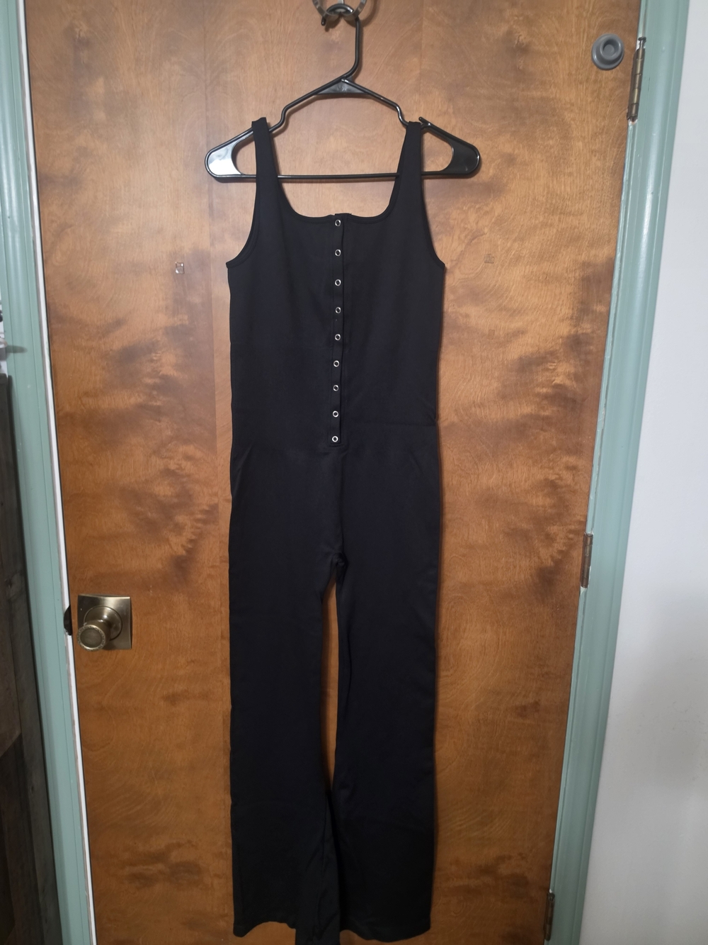 Black Snap-Front Sleeveless Jumpsuit with Wide Legs